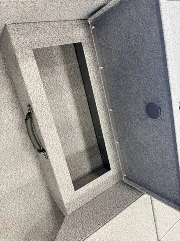 Slide: The Image of Interior of a 2026 Yamaha Boats model with storage compartment. - 27