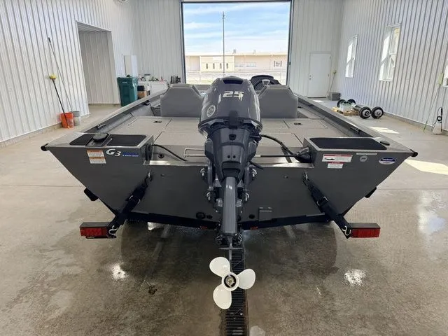 Slide: The Image of Yamaha Boats SPSMN 1710PFX 2026 VNL in a garage. - 6