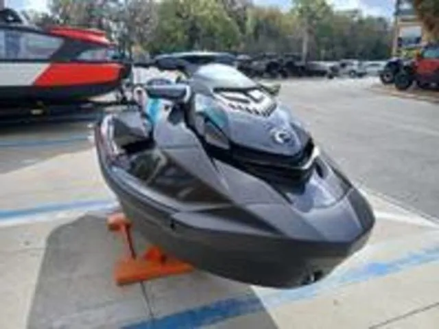 Slide: The Image of 2026 Sea-Doo GTR 230 jet ski on a parking lot. - 3