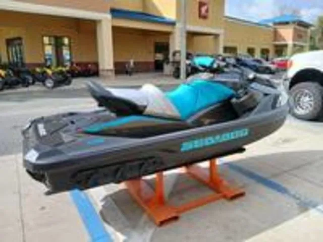 Slide: The Image of 2026 Sea-Doo GTR 230 jet ski on a parking lot. - 6