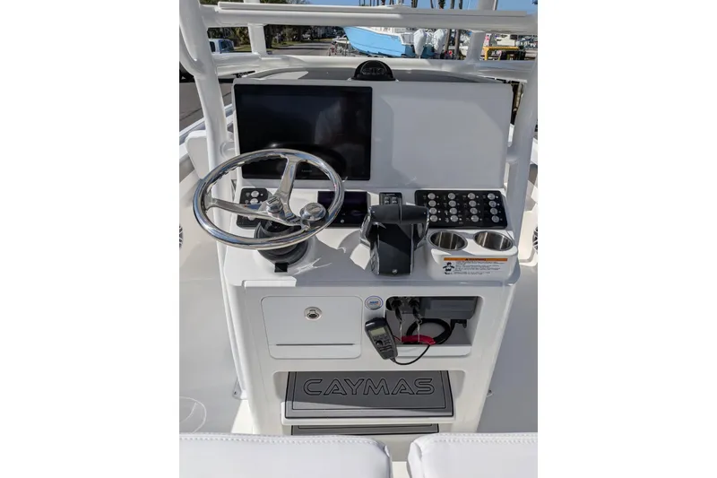 Slide: The Image of Interior of 2026 Caymas 281 HB boat, featuring a compact, modern bathroom with control panel. - 10