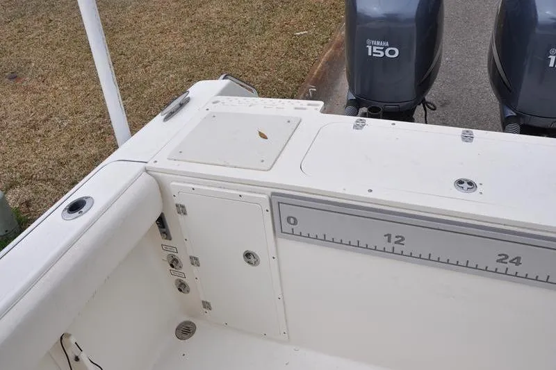 Slide: The Image of 2006 Pursuit 2570 Center Console boat with Yamaha 150 engines, deck view. - 32