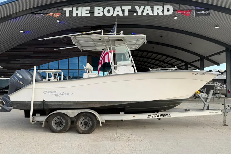 The Image of 2004 Cape Horn 24 boat on trailer at The Boat Yard, featuring Yamaha engine. - 1