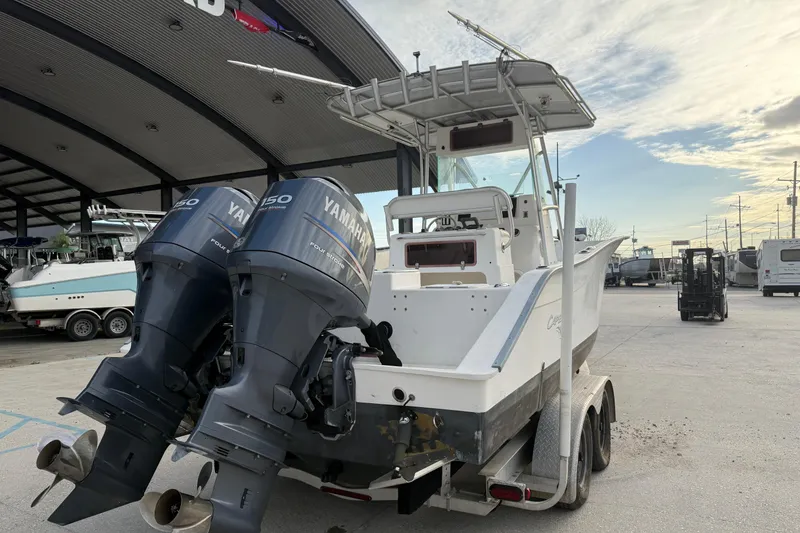 Slide: The Image of 2004 Cape Horn 24 boat with dual Yamaha 150 engines on a trailer. - 3
