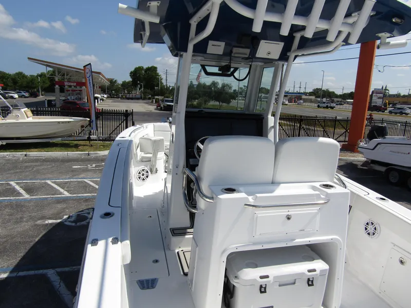 Slide: The Image of 2024 Wellcraft 263 Fisherman boat interior with helm station and seating. - 36