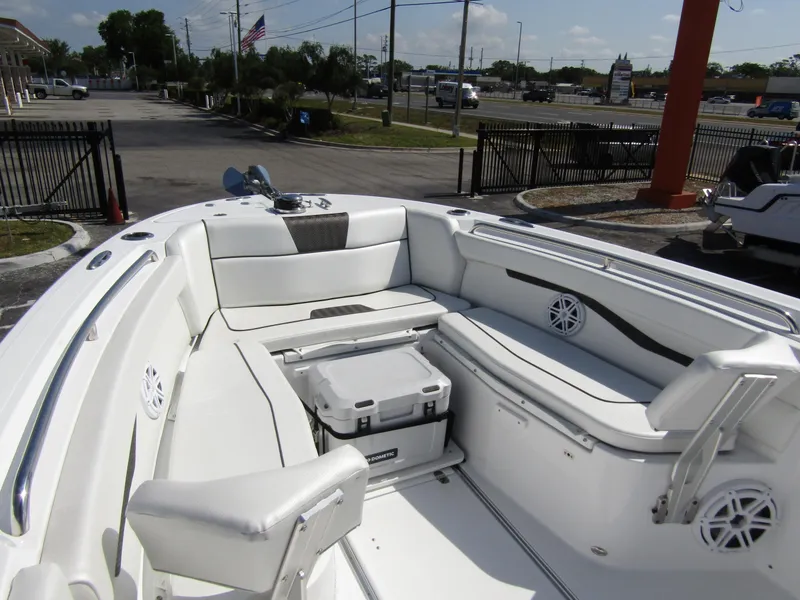 Slide: The Image of 2024 Wellcraft 263 Fisherman boat interior with seating and storage. - 5