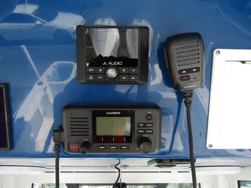 Slide: The Image of Garmin and JL Audio equipment on 2024 Wellcraft 263 Fisherman boat. - 24