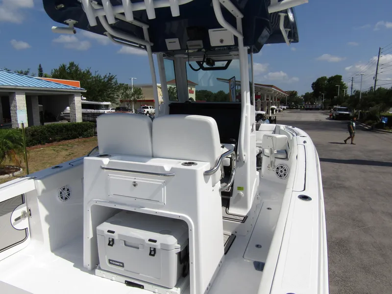 Slide: The Image of 2024 Wellcraft 263 Fisherman boat interior with seating and storage. - 37