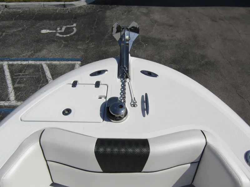 Slide: The Image of 2024 Wellcraft 263 Fisherman boat bow with anchor and seating. - 4