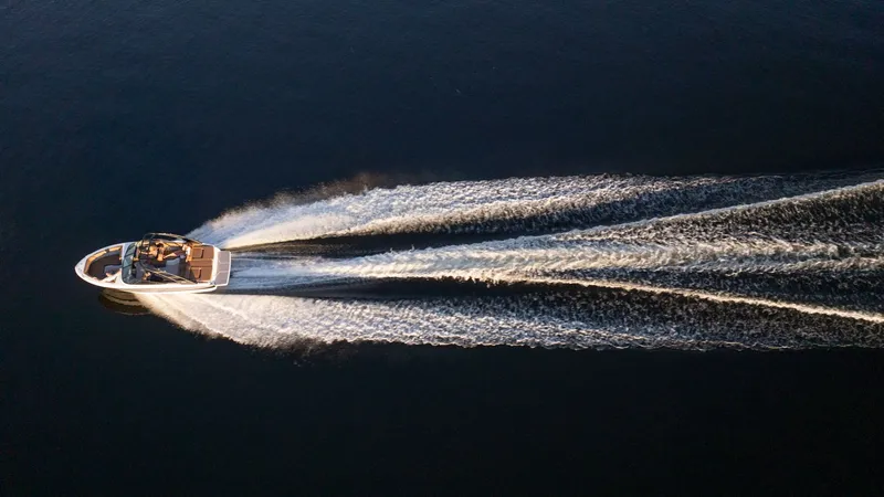 Slide: The Image of Regal LS2 Surf Ultimate 2026 on a serene river at sunset. - 14