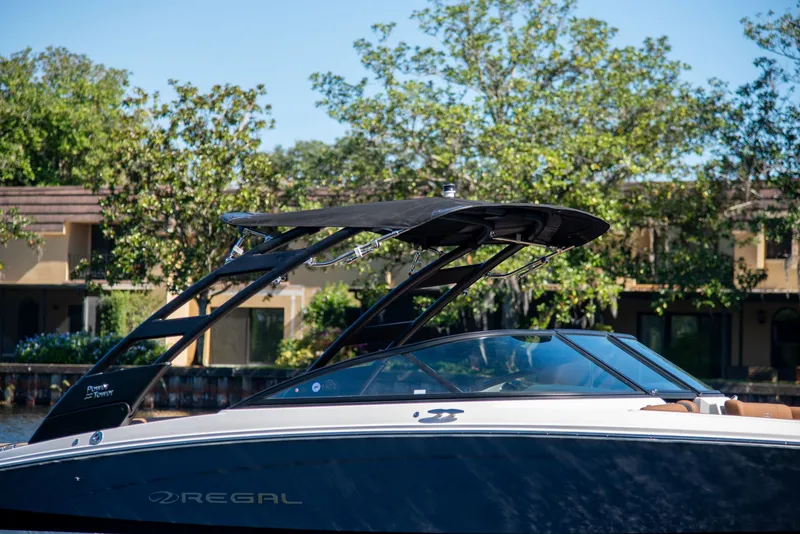 Slide: The Image of Regal LS2 Surf Ultimate 2026 boat display with GPS and map interface. - 16