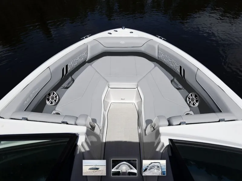 Slide: The Image of 2026 Regal LS2 Surf Ultimate boat on beach at sunset. - 2