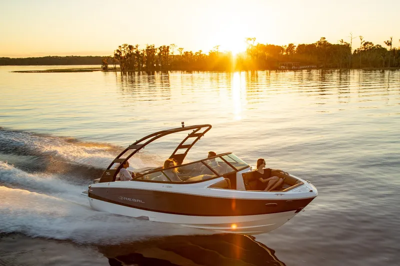 Slide: The Image of Interior of 2026 Regal LS2 Surf Ultimate boat on open water. - 4