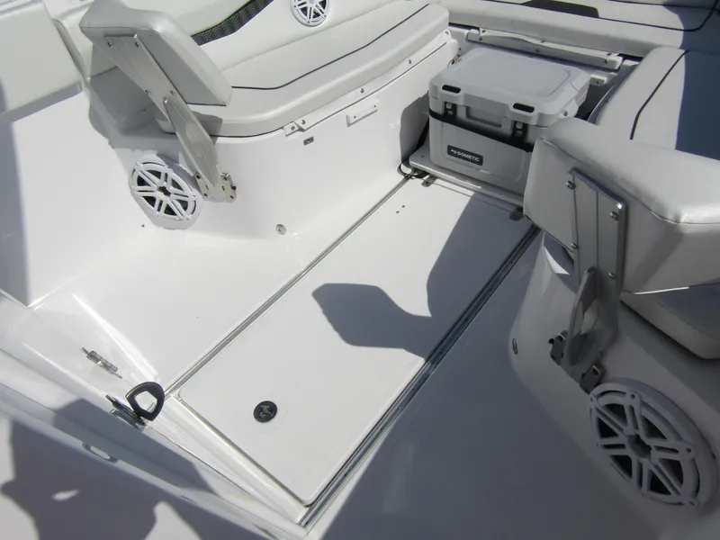 Slide: The Image of 2024 Wellcraft 263 Fisherman boat interior with seating and storage compartments. - 8