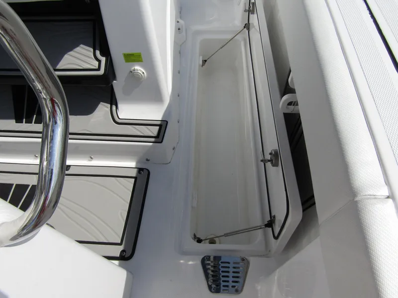 Slide: The Image of 2024 Wellcraft 263 Fisherman boat interior storage compartment. - 35