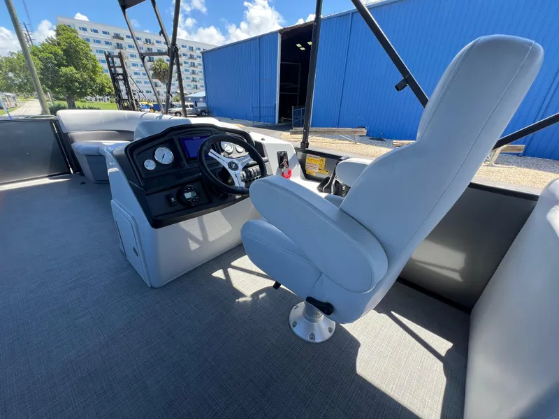 Slide: The Image of Interior of 2023 Bentley Pontoons 243 Navigator with steering console. - 10