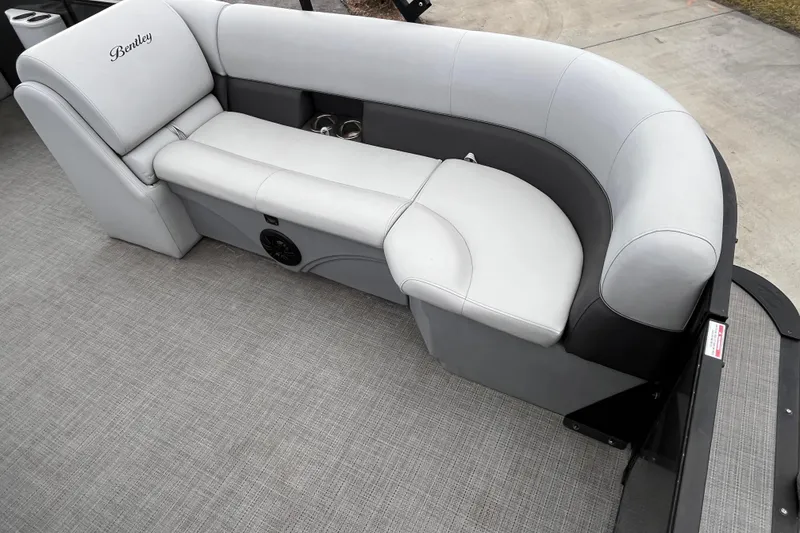 Slide: The Image of 2023 Bentley Pontoons 243 Navigator interior with luxurious seating and modern design. - 20