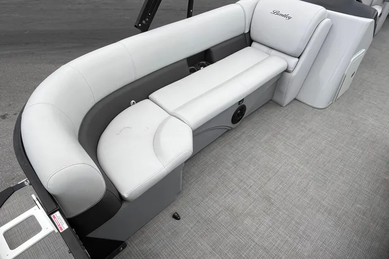 Slide: The Image of 2023 Bentley Pontoons 243 Navigator interior with luxurious seating and modern design. - 21