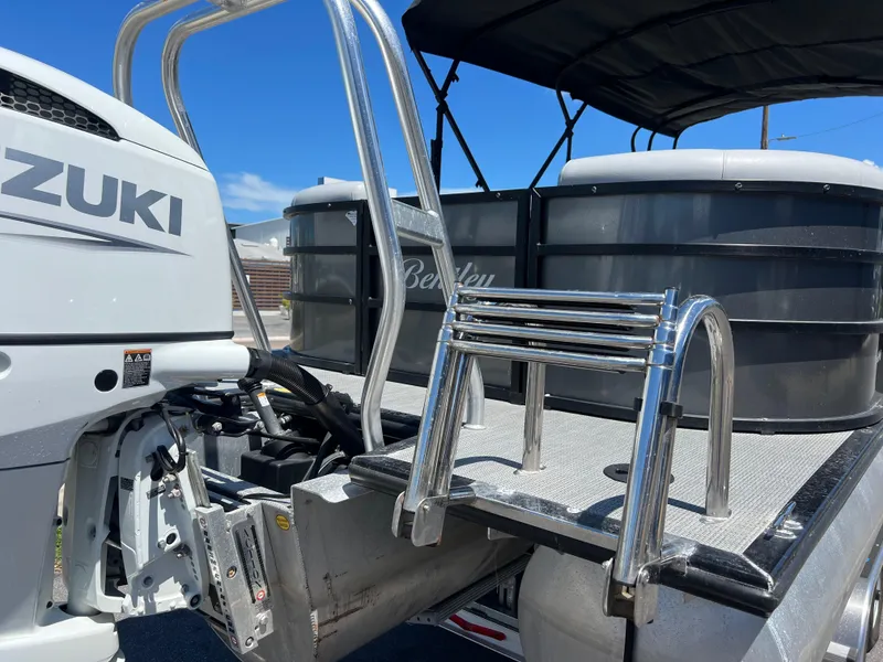 Slide: The Image of 2023 Bentley Pontoons 243 Navigator with Suzuki engine, rear view. - 5