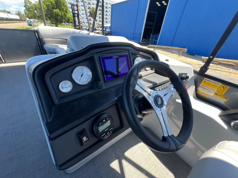 Slide: The Image of Dashboard of a 2023 Bentley Pontoons 243 Navigator pontoon boat. - 9