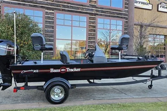 The Image of 2026 Tracker Bass Tracker Classic XL boat parked outdoors, showcasing sleek design and modern features. - 0