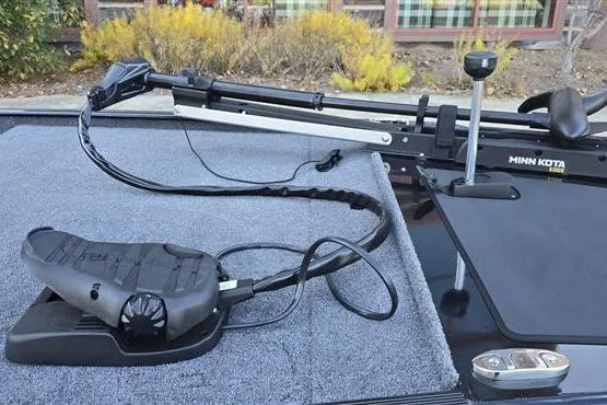 Slide: The Image of 2026 Tracker Bass Tracker Classic XL with Minn Kota trolling motor on deck. - 4