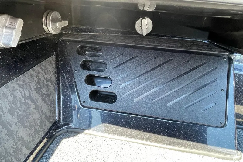 Slide: The Image of Interior detail of 2026 Nitro Z19 XL Pro boat, featuring sleek black panel design. - 7
