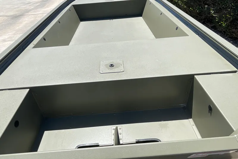 Slide: The Image of 2026 Tracker Grizzly 1648 Utility boat interior, showcasing spacious, durable design. - 10