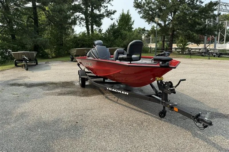 Slide: The Image of 2026 Tracker Pro Team 175 boat on trailer in outdoor setting. - 3