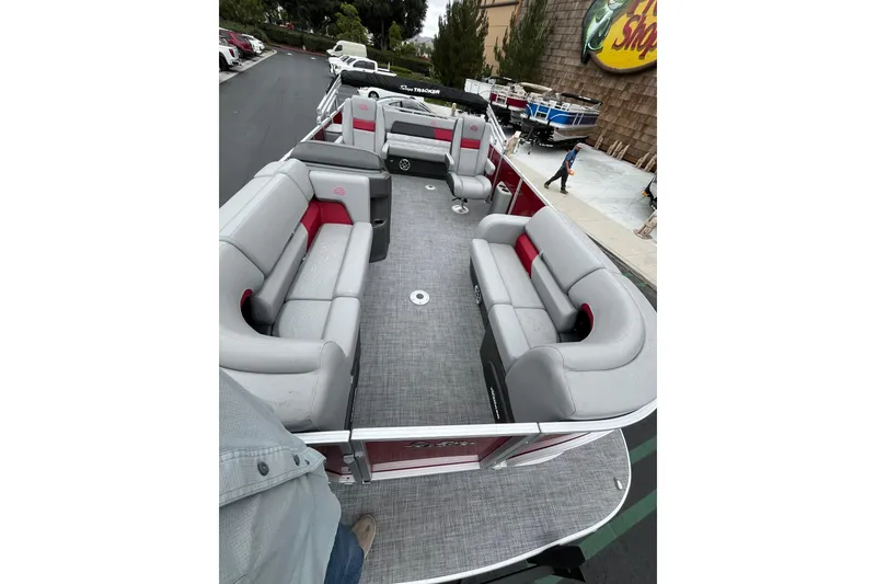Slide: The Image of 2026 Sun Tracker Party Barge 22 RF DLX with spacious seating and modern design. - 4