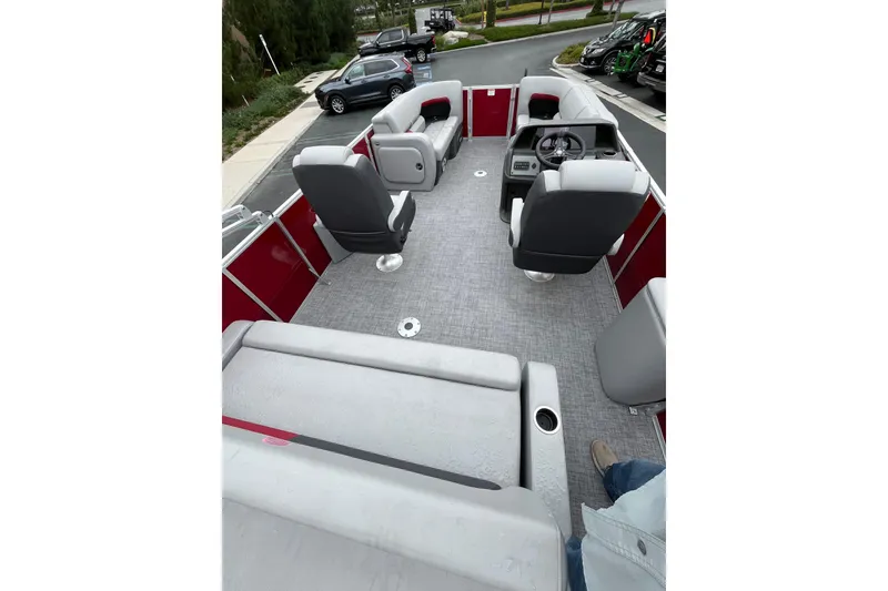 Slide: The Image of 2026 Sun Tracker Party Barge 22 RF DLX interior with spacious seating and modern design. - 5
