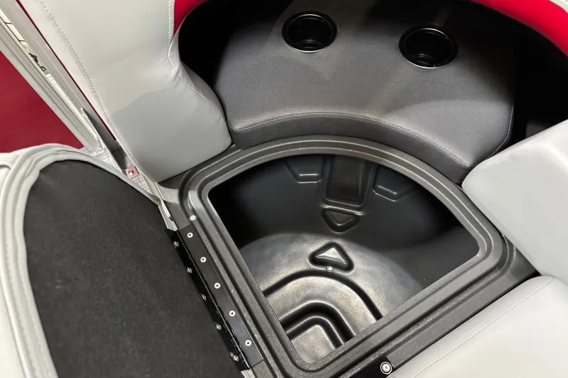 Slide: The Image of 2026 Sun Tracker Party Barge 22 RF DLX storage compartment with cup holders. - 35