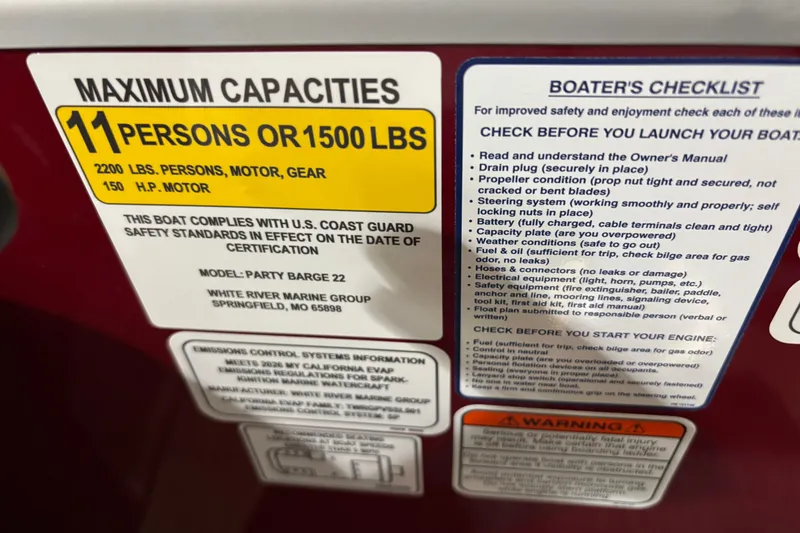 Slide: The Image of Safety and capacity labels on 2026 Sun Tracker Party Barge 22 RF DLX boat. - 45