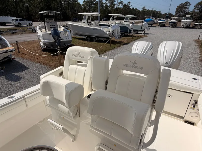 Slide: The Image of Regulator 28 boat 2022 with luxurious outdoor seating. - 11