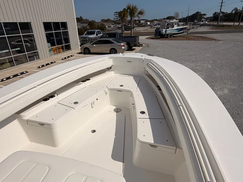 Slide: The Image of Regulator 28 boat 2022, bow deck view outdoors. - 14