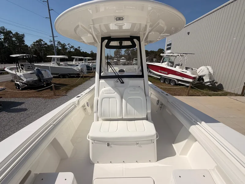 Slide: The Image of Regulator 28 boat 2022, interior view, displayed at a boatyard. - 17