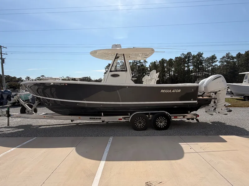 Slide: The Image of 2022 Regulator 28 boat on trailer, side view. - 5
