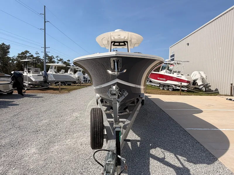 Slide: The Image of 2022 Regulator 28 boat on trailer, side view. - 7