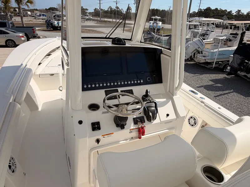 Slide: The Image of Interior view of a 2022 Regulator 28 boat with helm console. - 9
