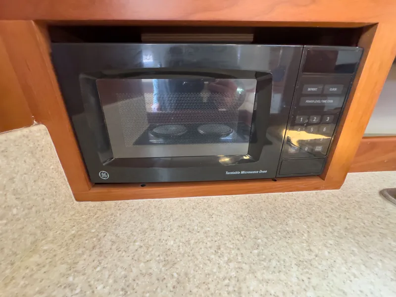 Slide: The Image of GE microwave in 2004 Mainship Pilot 34 boat. - 26