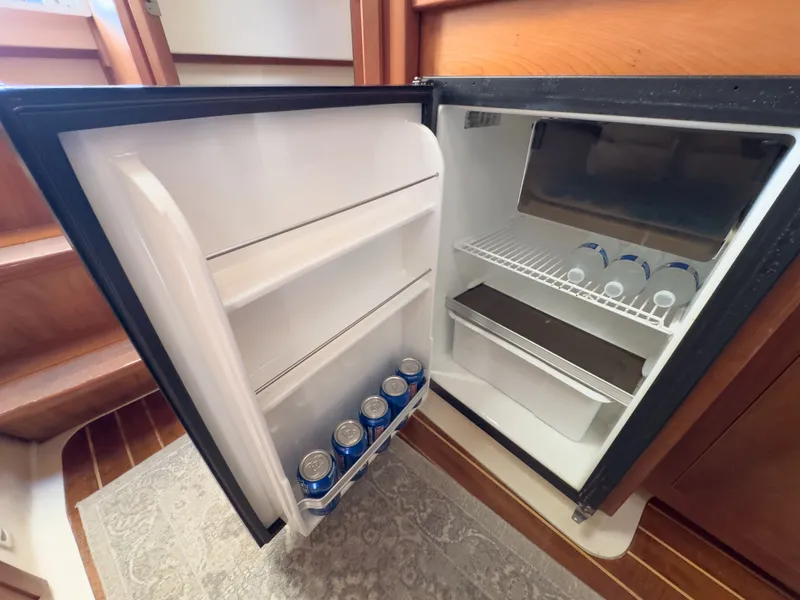 Slide: The Image of Open fridge on Mainship Pilot 34 boat, 2004 model. - 28