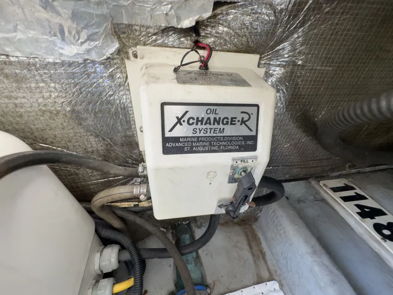 Slide: The Image of Oil change system in a 2004 Mainship Pilot 34 yacht. - 37
