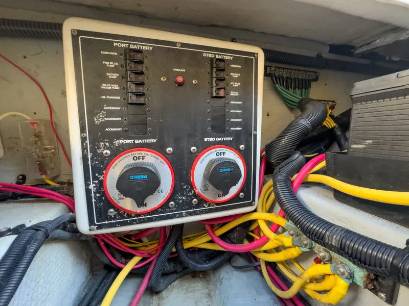 Slide: The Image of Battery switch panel on a 2004 Mainship Pilot 34 boat. - 43