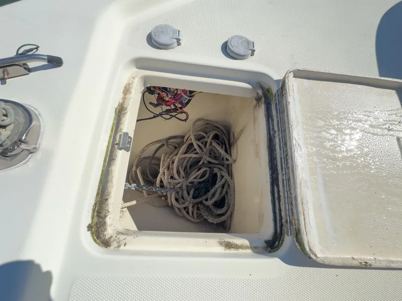 Slide: The Image of Open hatch with rope storage on 2004 Mainship Pilot 34. - 46
