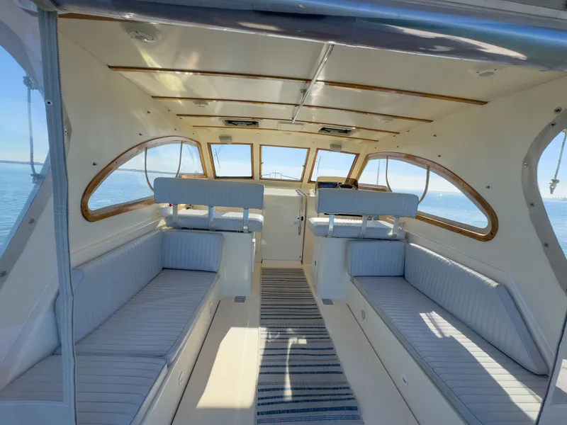 Slide: The Image of Interior of a 2004 Mainship Pilot 34 yacht on the water. - 7
