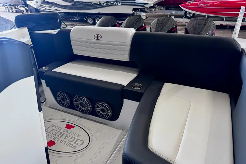 Slide: The Image of Interior of 2025 Cigarette 42' Auroris boat with stylish seating and speakers. - 11