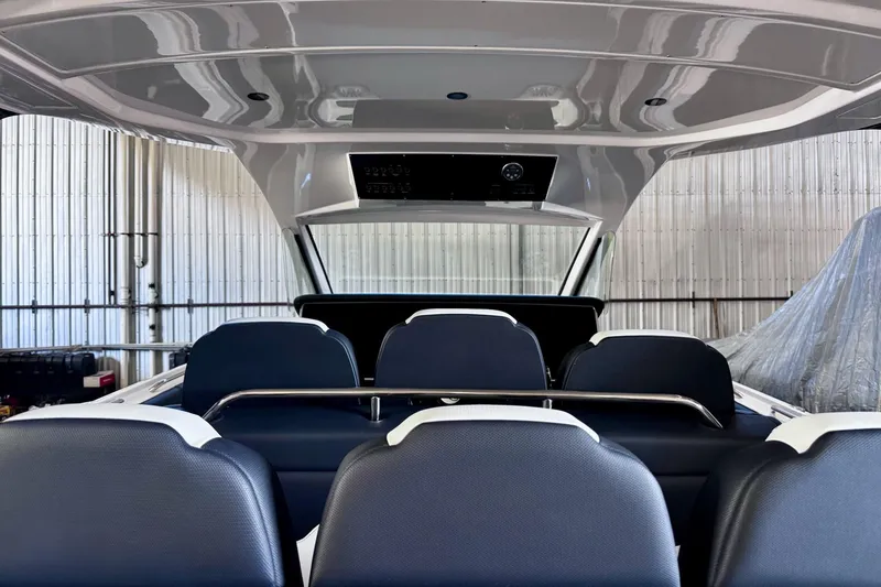 Slide: The Image of Interior view of 2025 Cigarette 42' Auroris boat, showcasing sleek seating and modern design. - 13