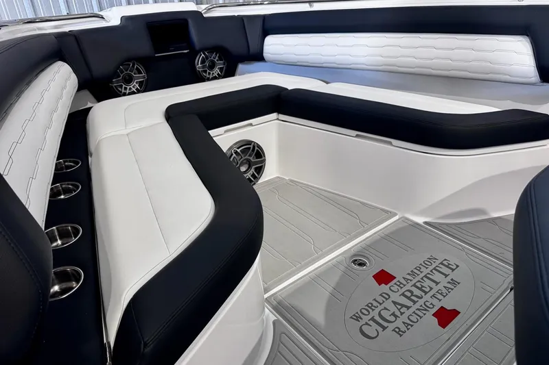Slide: The Image of Luxurious interior of 2025 Cigarette 42' Auroris boat with sleek seating and sound system. - 24