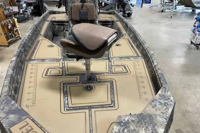 Slide: The Image of 2026 Excel 203 Bay Pro Elite boat interior with seating and measurement markings. - 7