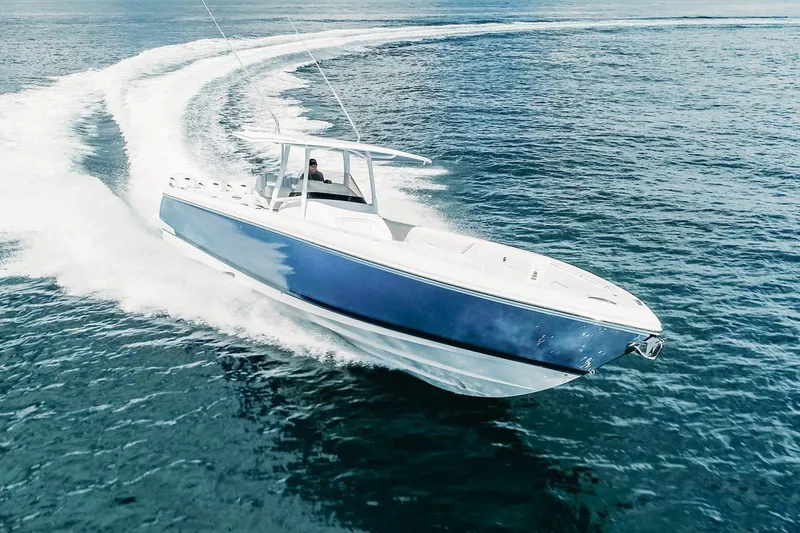 The Image of Manufacturer Provided Image: 2022 Intrepid 407 Nomad FE boat cruising on open water. - 0